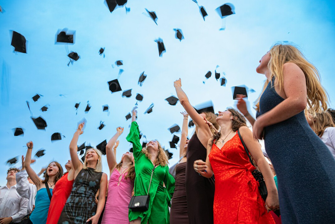 graduates celebrating completion