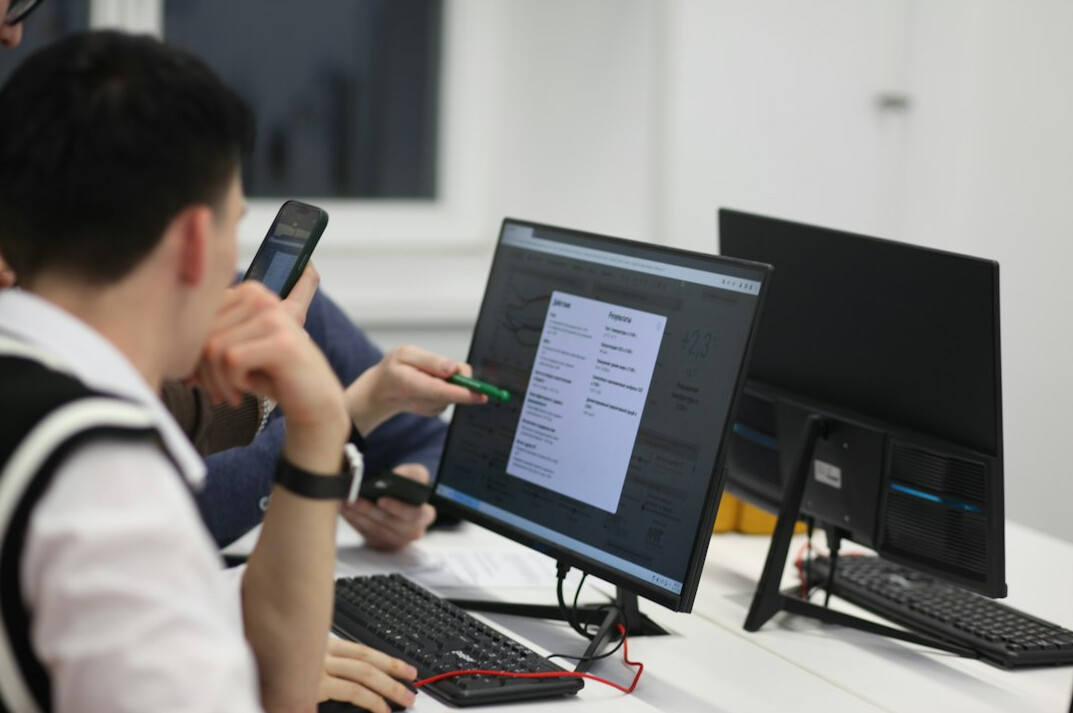 japanese students coding in classroom